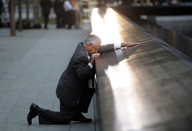 Robert Peraza weeps at the 9/11 memorial 