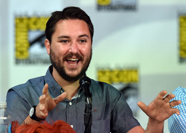 Wil Wheaton sitting on a panel at Comic Con