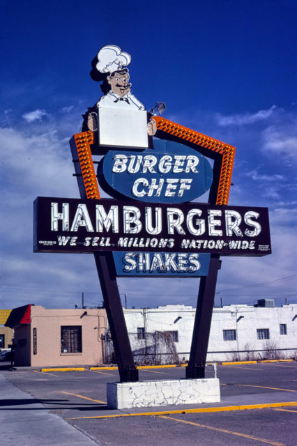 Photo of a Burger Chef sign in a parking lot