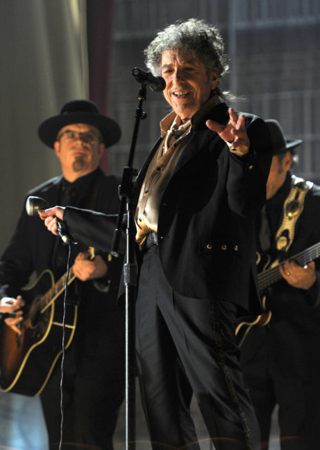 Photo of Bob Dylan performing at the 53rd Annual Grammy Awards