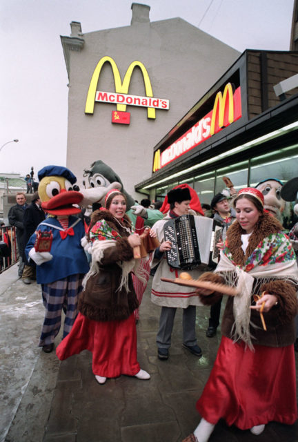 Performers outside a McDonald's restaurant