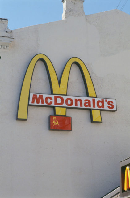 Close-up of the McDonald's logo on the side of a building