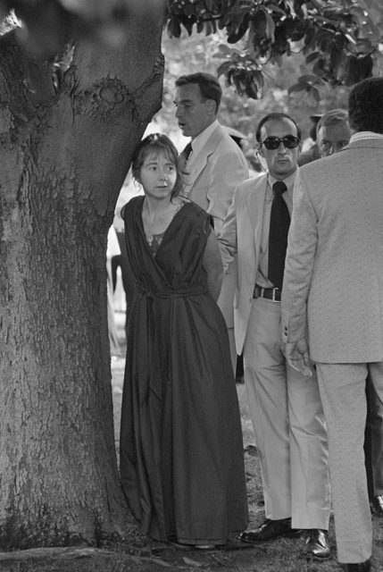 Lynette Fromme detained by a tree following her assassination attempt on Gerald Ford