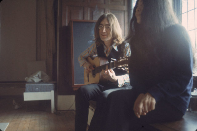 John Lennon playing guitar for Yoko Ono