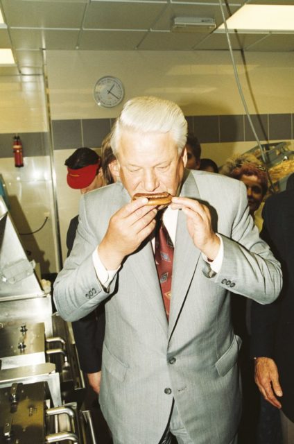 Boris Yeltsin eating a hamburger