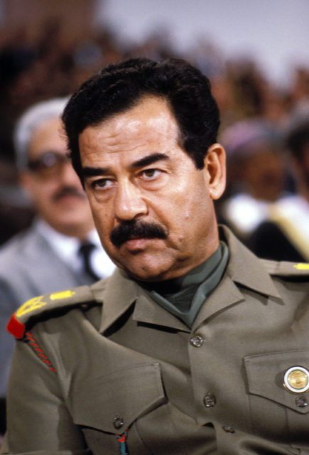 Headshot of Saddam Hussein