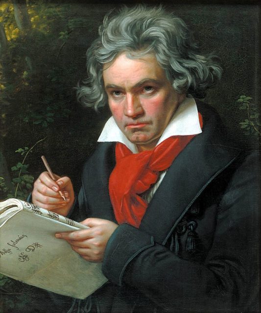 Coloured painting of a white man with untamed grey hair in a jacket writing music on paper.