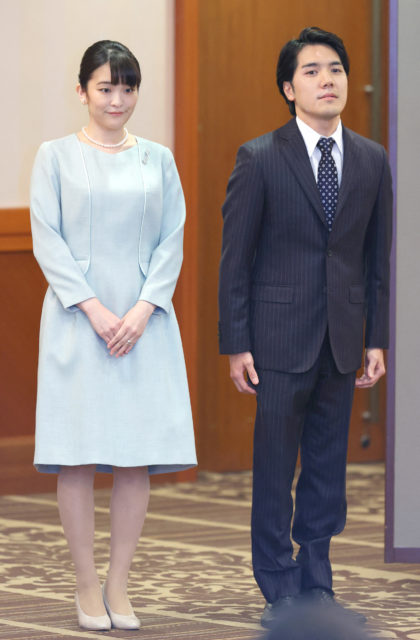 Princess Mako beside her new husband Kei Komuro
