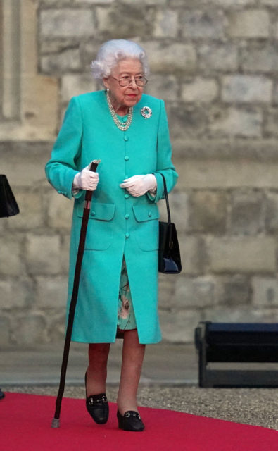 The Queen wears a aquamarine outfits and a newly commissioned brooch to mark her Platinum Jubilee.