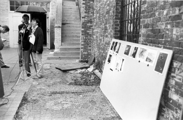 A board outside the museum shows missing works after robbery.