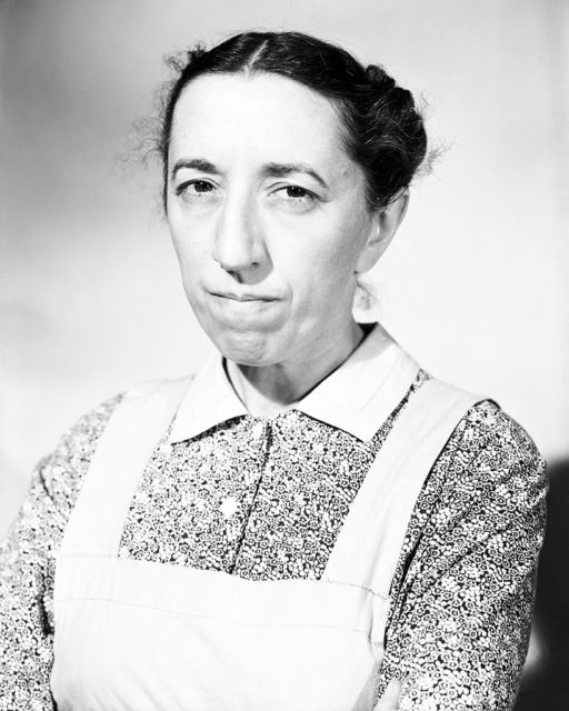 Black and white image of Margaret Hamilton with her hair up. 