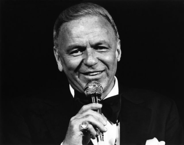 Hedashot of Frank Sinatra singing with mic in hand