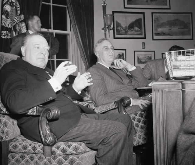 Winston Churchill and Franklin Roosevelt sitting side by side