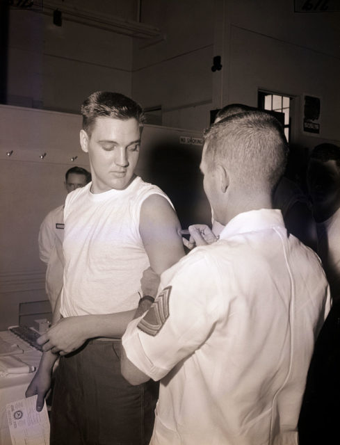 Elvis receives vaccines as part of his military training