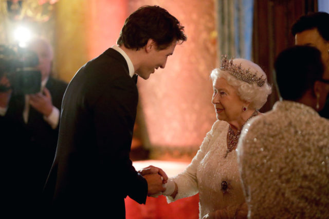 Queen Elizabeth II and Justin Trudeau shaking hands