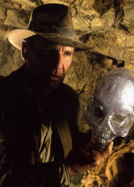Indiana Jones holding a crystal skull