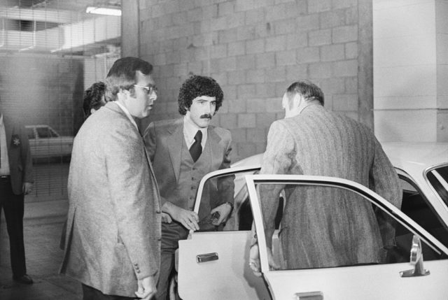 Kenneth Bianchi exiting a vehicle