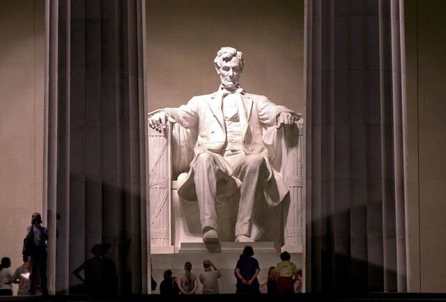People looking at the Lincoln Memorial
