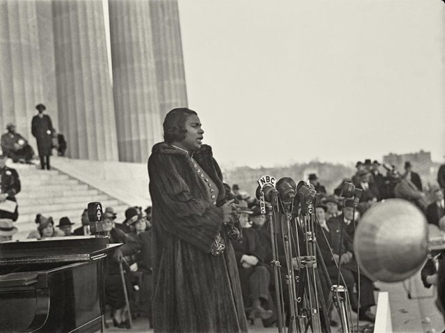 Marian Anderson standing before a group of people