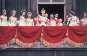 Queen Elizabeth standing on the balcony at Buckingham Palace