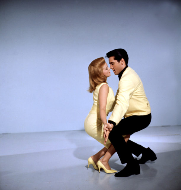 Elvis and Ann-Margaret dance closely together