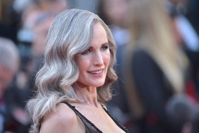 Andie MacDowell posing on a red carpet