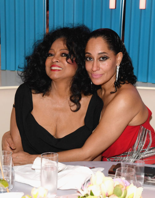 Tracee Ellis Ross embraces her mother Diana Ross at an event