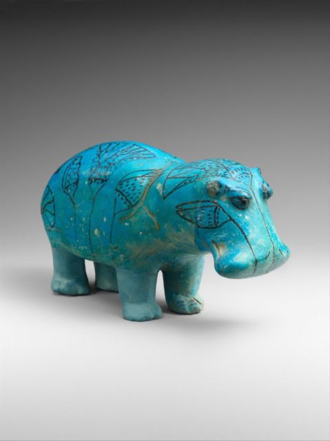 Coloured photo of the blue hippopotamus statue known as William.