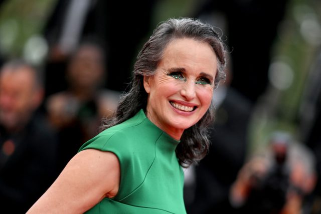 Andie MacDowell posing on a red carpet