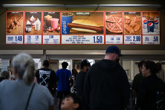 The menu board at Costco, showing the price of the hot dog soda meal