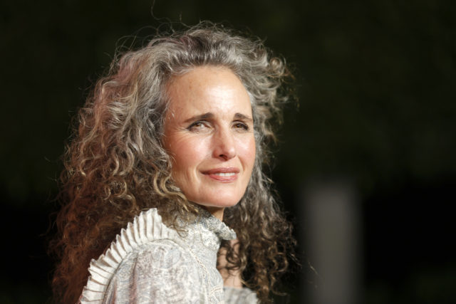 Andie MacDowell posing on a red carpet