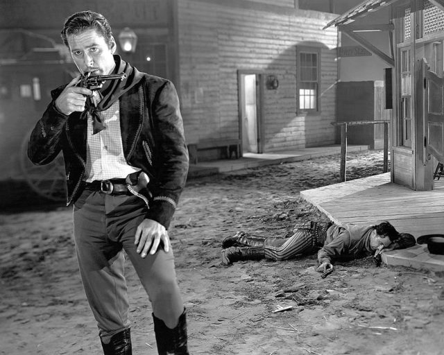 Errol Flynn looks dazed on set for Western film 'San Antonio'