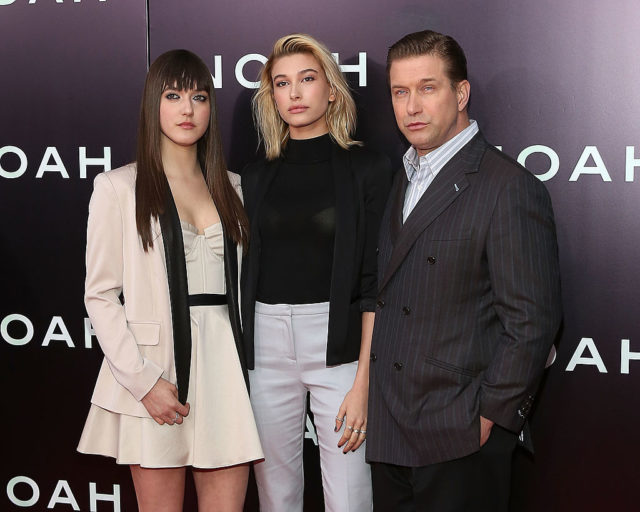 Alia Baldwin, Hailey Baldwin, and their father Stephen Baldwin on the red carpet at an event
