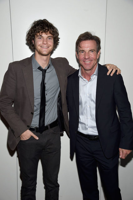 Jack Quaid and Dennis Quaid pose together at an event