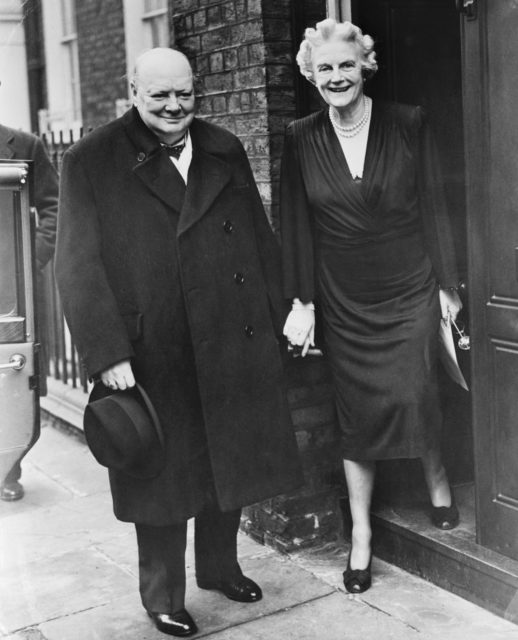 Winston and Clementine standing on the sidewalk