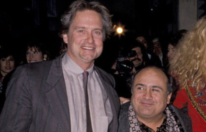 Michael Douglas and Danny DeVito standing together