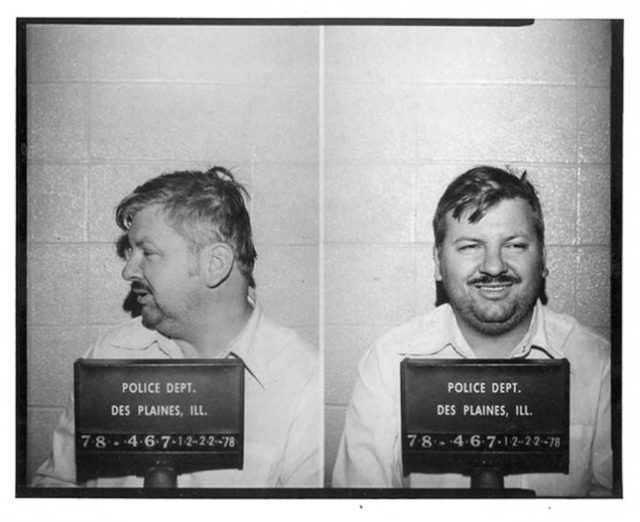 Black and white mug shot of John Wayne Gacy