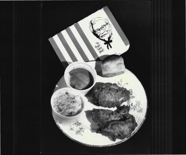 KFC meal consisting of fried chicken, coleslaw, a bun and gravy