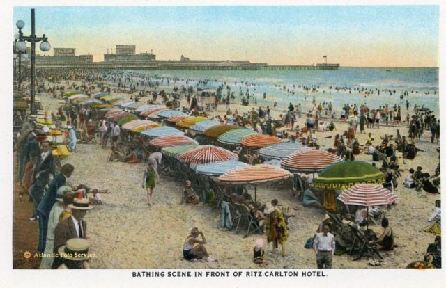 A 1921 postcard shows a crowded beach at the Ritz Carlton in Atlantic City, New Jersey