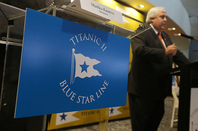 Clive Palmer speaking at a podium