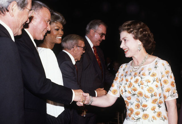 Frank Sinatra shaking Queen Elizabeth II's hand