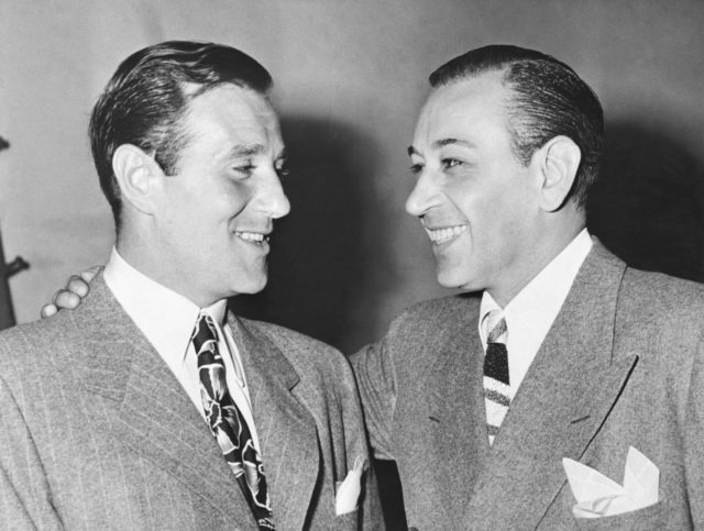 George Raft with his arm around Bugsy Siegel