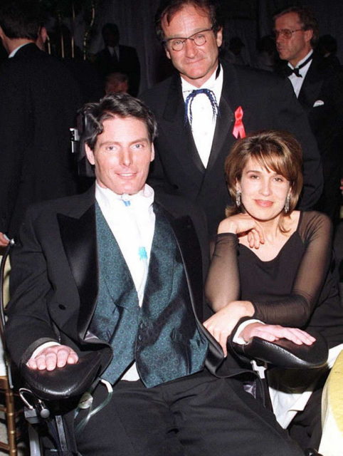 Christoper, Robin and wife Dana pose backstage at an awards show