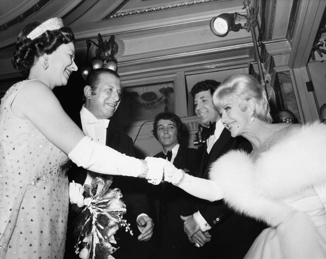 Ginger Rogers shaking Queen Elizabeth II's hand