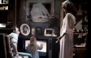 JoBeth Williams, Craig T. Nelson and Heather O'Rourke as Diane, Steve and Carol Anne Freeling in 'Poltergeist'