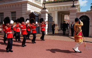 Guards march by Clarence House to celebrate Queen Elizabeth the Queen Mother's 98th birthday