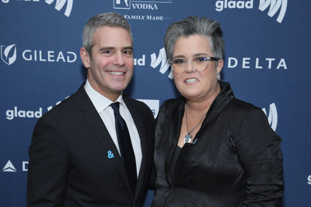 Andy Cohen and Rosie O'Donnell standing together