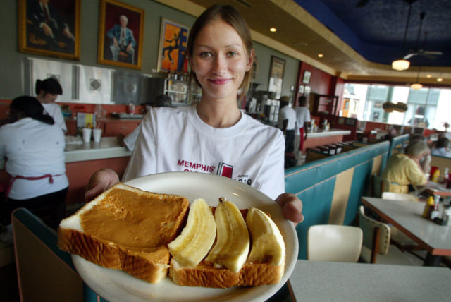 Girl holding Elvis famous sandwich