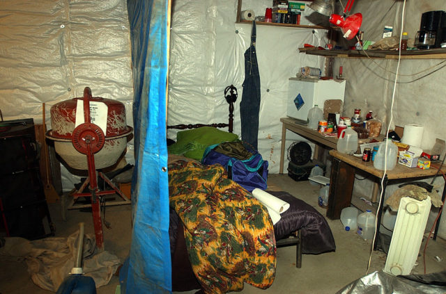 Small living space with bed and kitchen where Marvin Heemeyer lived.