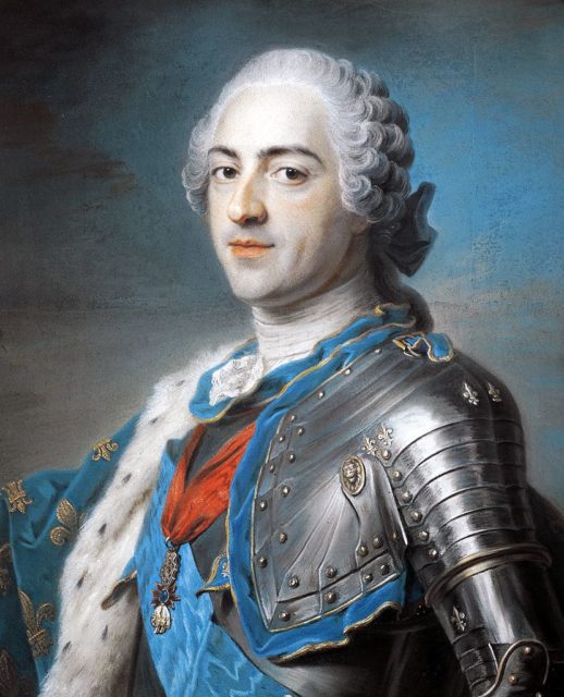 Portrait of Louis XV wearing a white wig, armor, and a blue cape. 